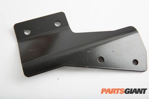 The muffler bracket has some minor scratches and gouges on it, but is otherwise straight and ready to use.