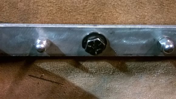 Bags mounts  I replaced the stock bolts with grade 6 bolts long enough to reach the nut in the fender.