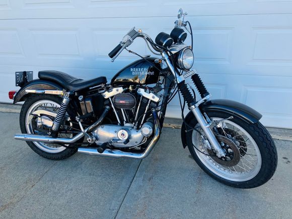 My 1974 XLCH; the typical work in progress. It starts and rides, have correct seat. 1979 Low Rider front end. Will finish with fresh paint and 1975 tank decals this winter (minus AMF script in decal)  