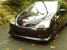 sorry for the cell phone pic; 
-JDM Front Bumper &amp; Re-bar
-JDM CTR Headlights(HID)
-JDM Japan Air Walker Lip
-Authentic Mugen Grill
***This is current***