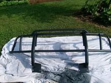 After alot of sanding and some duplicolor bed liner and clear coat.