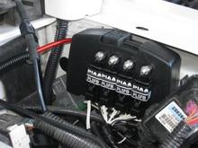 Fuse box with PIAA relays installed; 2 for the front lights, 1 for the rear lights, and one for the Air Compressor