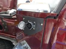 Viewing charger port for charger plug in