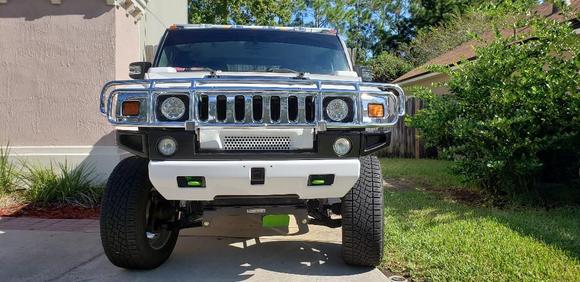 White powder coated bumper and a some green on skid plate and tow hooks.