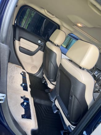 Rear seat is included but not in the picture. One small tear on it. Thats all. Leather. 