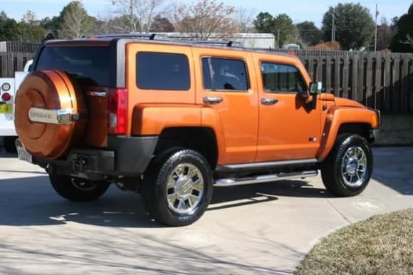 Look at that Desert Orange (or as the Orlando dealership calls it - Orange Fusion!)  Either way, the orange is set off by the chrome.  This is the only one in town!!