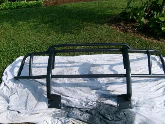 After alot of sanding and some duplicolor bed liner and clear coat.