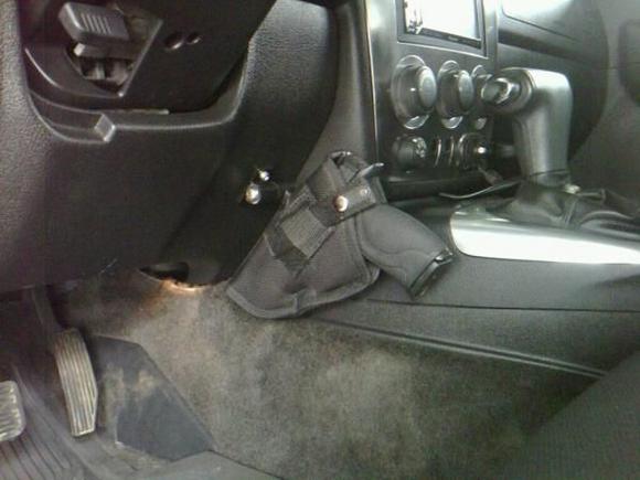 Grassburr vehicle mounted holster installed.