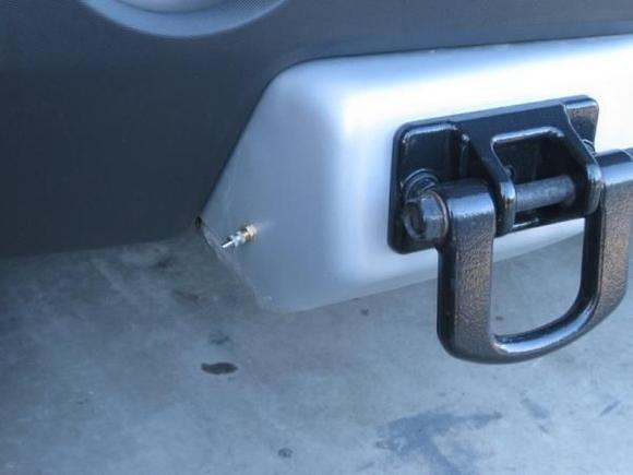 Port for air compressor line attachment, mounted the compressor tank behind the front guard.