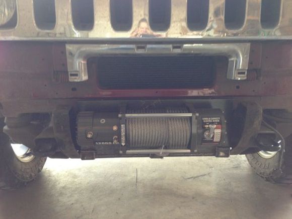 first mount with the winch on plate to the truck. I soon realized that I would need to flip the winch 180 degrees to fit the wires.