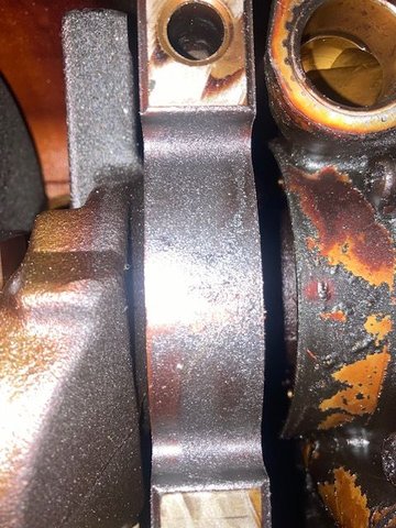 Bearing Caps: Pay Attention to the number, as well as the direction of which way to install them.  The arrow is pointing towards the FRONT of the engine.  