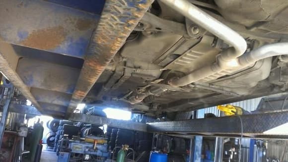 Between the high flow cat and the y-pipe an Insynerator Bullit muffler was welded in. The final step is to remove the Insynerator 2-chambered mufflers and replace it with straight pipe and oval stainless steel tips.