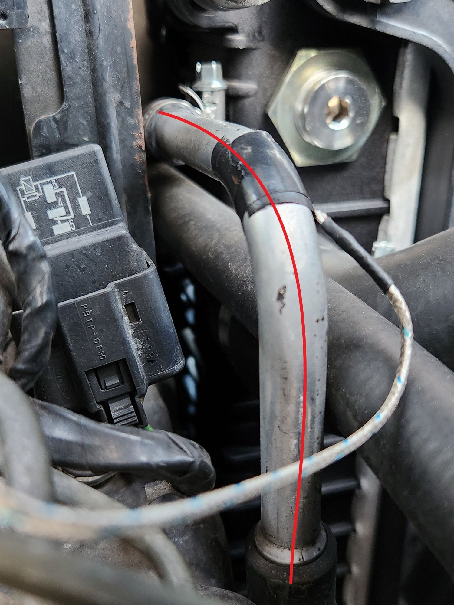 This is the return transmission oil cooler line. Just in case you're wondering there is a thermocouple attached to the pipe to get a temperature reading. 