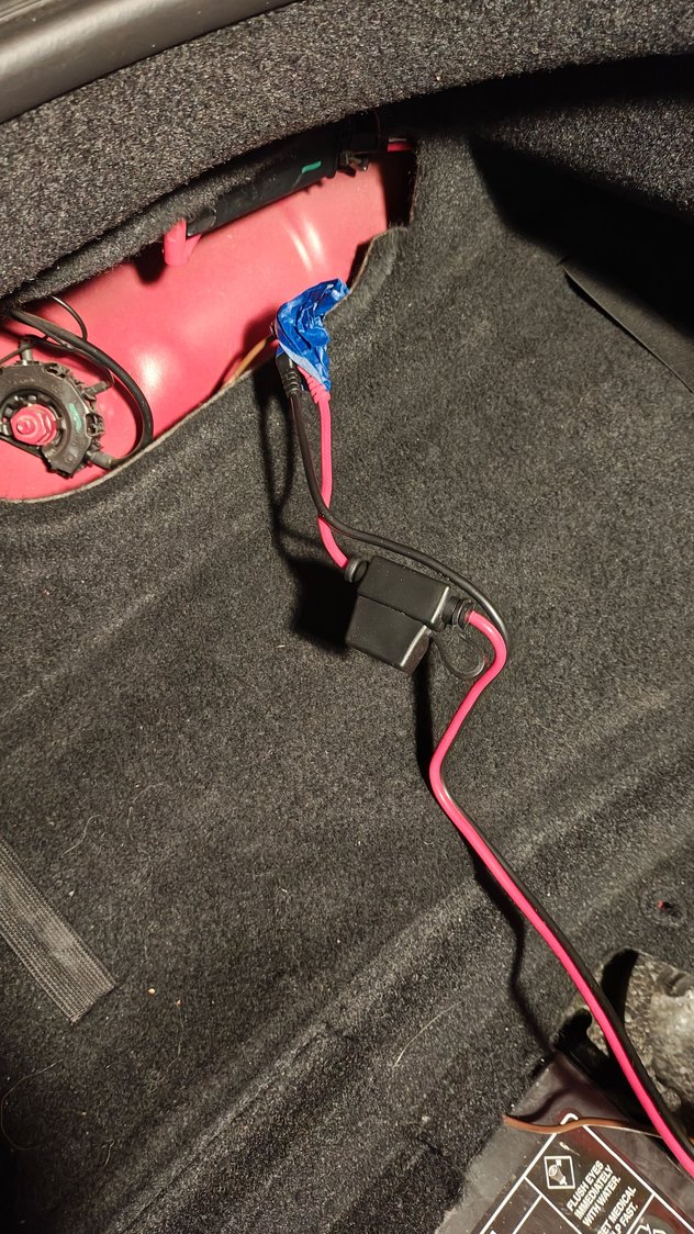 fished the leads under the panel then over to the  appropriat  terminals  nex to the battery