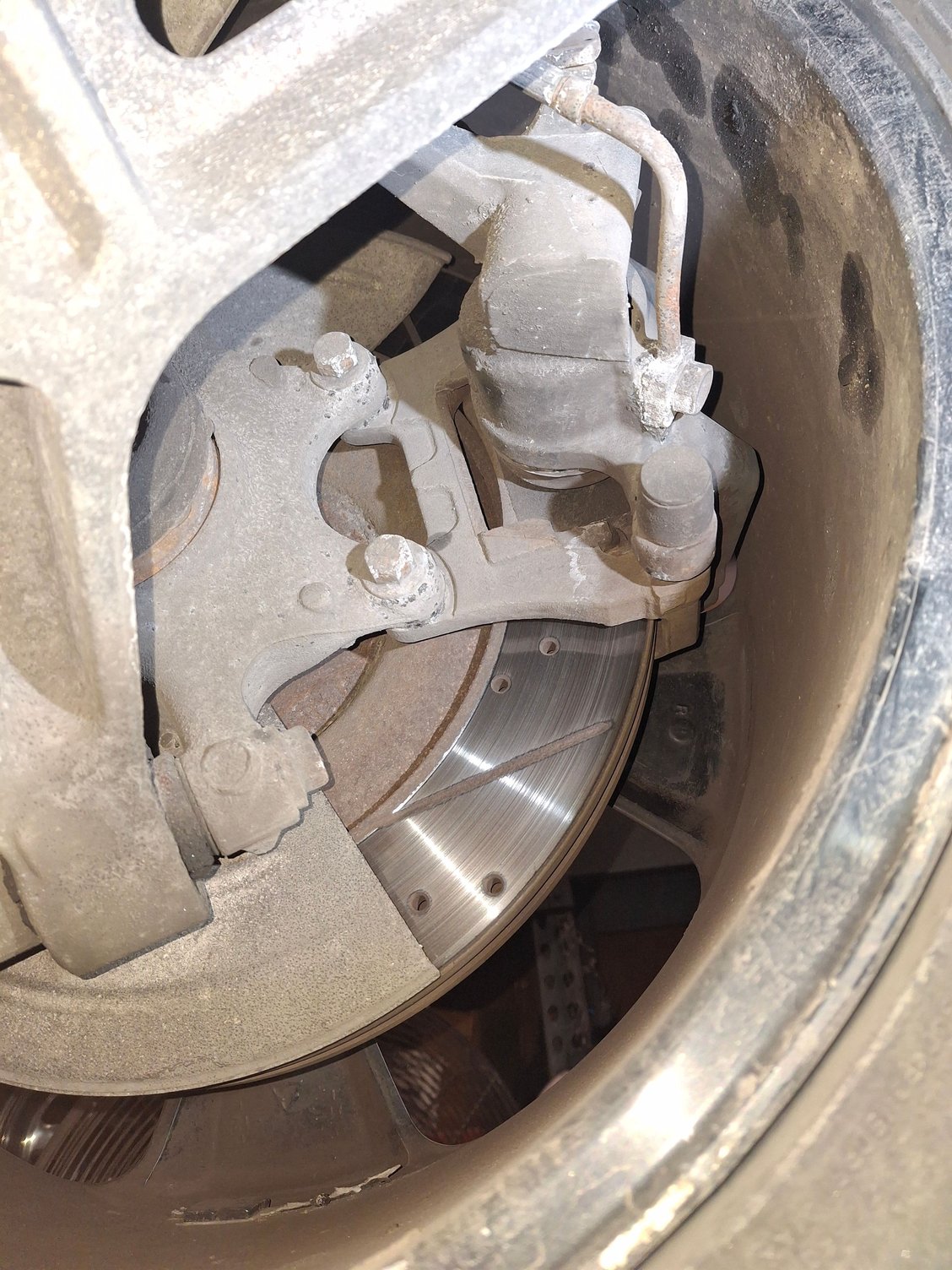Bolt location for rear calipers