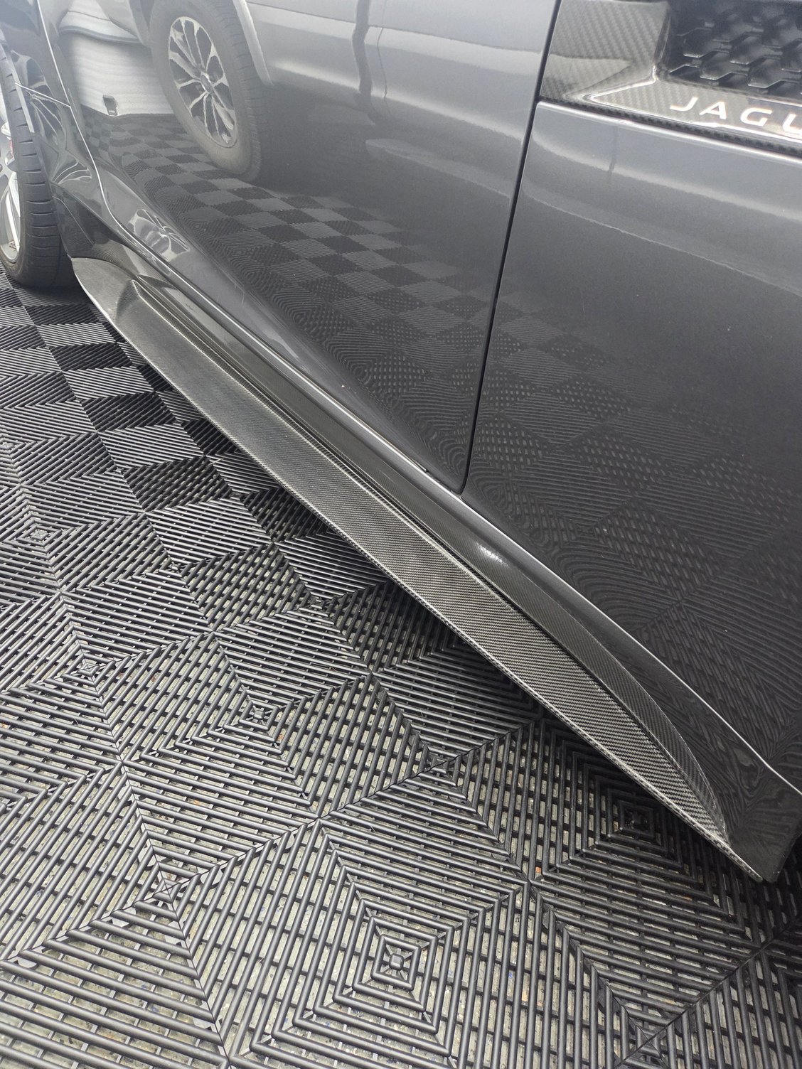 Carbon fiber side skirts. This was a bigger job than I thought it would be butb they came out well.