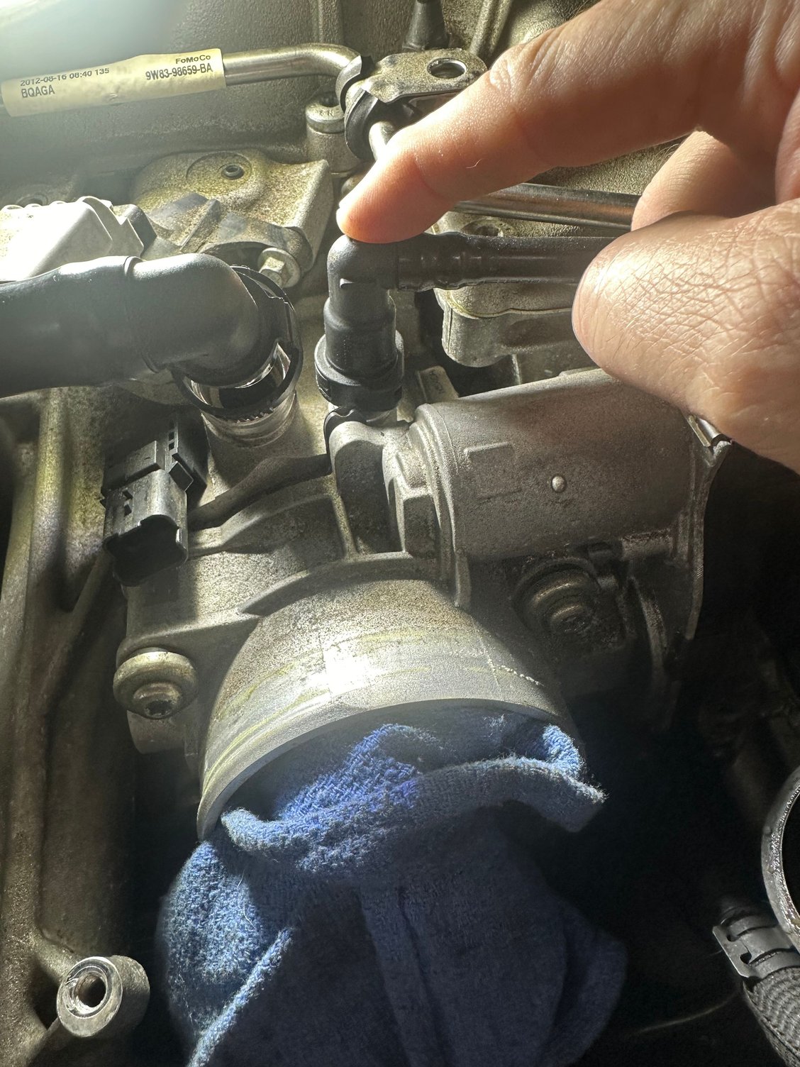 What is the trick to remove this hose?
