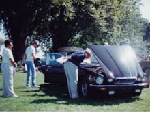 My dad standing to the left with his 1985 Vanden Plas being judged in the Jaguar competition in Dearborn Michigan at the Ford Estate.