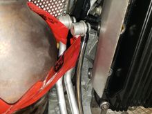 Port connections using 90 degree ploy 3/8 to 1/2 barbs. Lines held back for installation of port fittings by tuck tape. Made fitting installation much easier. Will remove tape before starting procedure because it is attached to exhaust. However, I need to find what is causing the leak before continuing. 