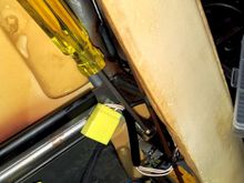 Remove only one torx screw to free the cable.