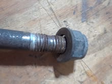 Lower strut mount bolt. Hammering on the lower wishbone mounting plates due to under torquing - primary cause of suspension clunk.