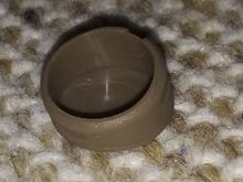 Bottom view of screw cover
