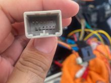 This is a really crap pick but in the background you can see the adapter connected to the emergency light wire that comes from the car. That orange wire coming from it has the plug your jag uses which is all that’s needed. On your car that white end connects to the radio and the grey side to your car. But with the extra adapter attached I need one with both sides as the white adapter. So any idea what size it is?