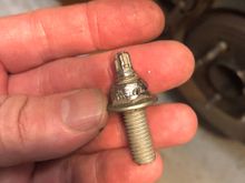 Stud showing rounded nut