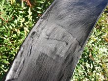 Gloss black enamel and 100 grit. Rinse and repeat.