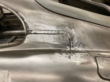 Original seam - lead filled by Jaguar but almost invisible from here back. Ready for fill and skimming