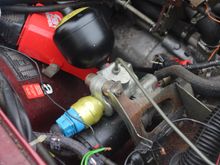 The Brake Pump on a 1989 XJS V12
The Braided Pipe is the Brake Fluid Feed into the Brake Pump from the Reservoir.
