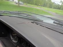 Crack runs from about left corner of demister to about 3/4 of the hump on the instrument cluster.