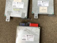 Clockwise, beginning top left: "LNB 1410AD/LNB 1410AE" (LWB), "LNB 1410AD/LNB 1410FE" (SWB), "LNB 1410AD" (my original ECU)