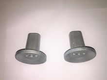 Subframe front bushes are Aluminium. Recoated with etch primer, then enamel. re-bonded to Rubber bushes