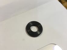 All 4 of those bolts that hold that lid down have these thick washers which are the same as the ones on your valve cover bolts. The part number is: NCA2575CA
It sounds like the bolt seal washers (pictured above) are just done for. They help apply downward pressure on the lid. I’d replace those next. 