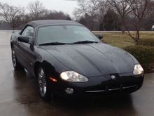 The day I brought her home! Made it Home fine, then first week everything went wrong! Hydraulic rood lines, coolant system, window motor failed, saw tons of paint damage not noticable with rain. Almost sold her! Never buy emotionally, especially in the rain!!!!