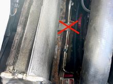 STRAP THROUGH A VERY NARROW SLIT DONT GO OVER THE PIPES