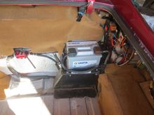 This shows the main filter (smart aftermarket in my case!). It is being fed from the pump which is under the cover under the battery. It exits to a long pipe that goes out on the lower front RHS and under the car.