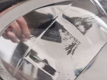 Closeup of scuffed chrome plating