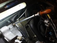 A long handled Socket Driver will come in handy for bolting it into the Car
