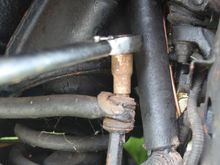 Undoing the Bolts on the Anti Roll Bar, they were really hard to undo but the Rubber Bushes were completely Shot Away