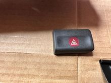 This is what the button covers look like I think you can carefully pry them off with a little curved pic without taking the switch pack apart. Whereas the white inner buttonYou have to take a pack apart and take it out from the back