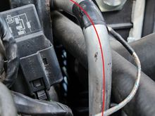This is the return transmission oil cooler line. Just in case you're wondering there is a thermocouple attached to the pipe to get a temperature reading. 