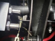 Adjustment outside transmission, inside engine compartment