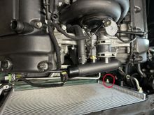 Red circle is around the lowest oil port 