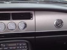 image brushed titanium vinyl wrap with piano black details. Chrome trim.