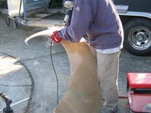9
Here, little Bro helps with the trimming and shaping of the wheel arch on the driver side rear quarter panel.  we both itched for weeks after this project!