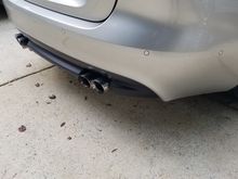 This gives you an idea. I had the existing rear diffuser modded to fit the quad tips and i had it painted a glossier (but not gloss) black
