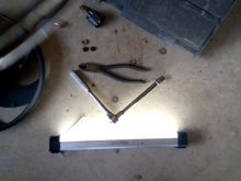 Light, 10mm socket and wire cutter for the zipties