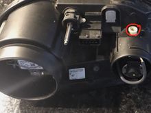 The ringed white adjuster does the dipped lights...where iis the adjuster for the main beam